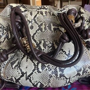 MICHAEL Michael Kors Gold and Black 
Genuine python’s snake skin